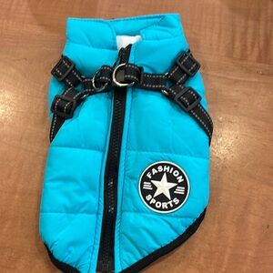 Small dog coat with built in harness. Aqua in color size medium.
